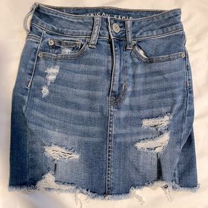 denim skirt with rips